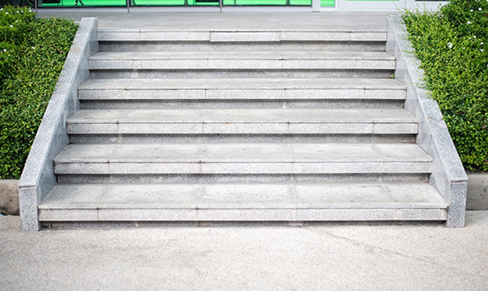 Concrete steps and sidewalks need to be kept in good shape at businesses.